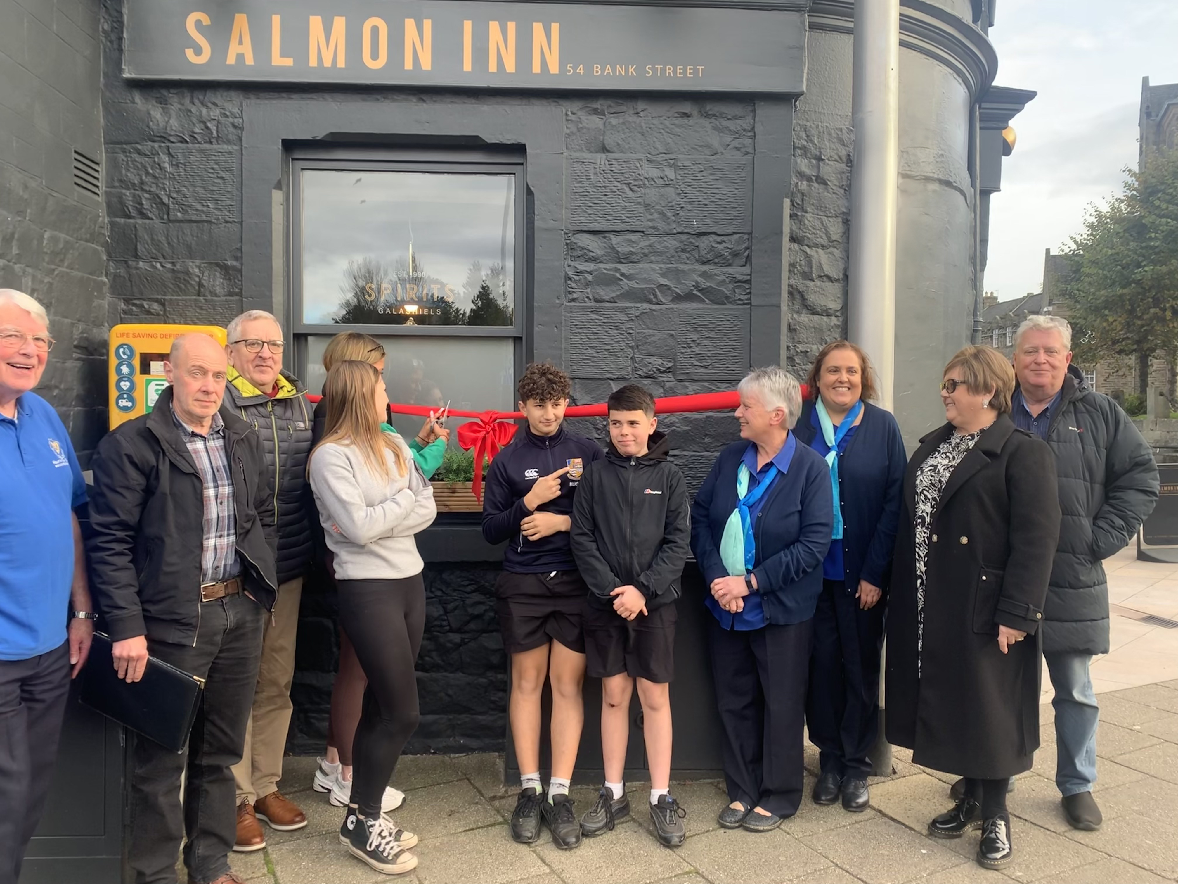 Background image - Ribbon Cutting Of The Defibrillator